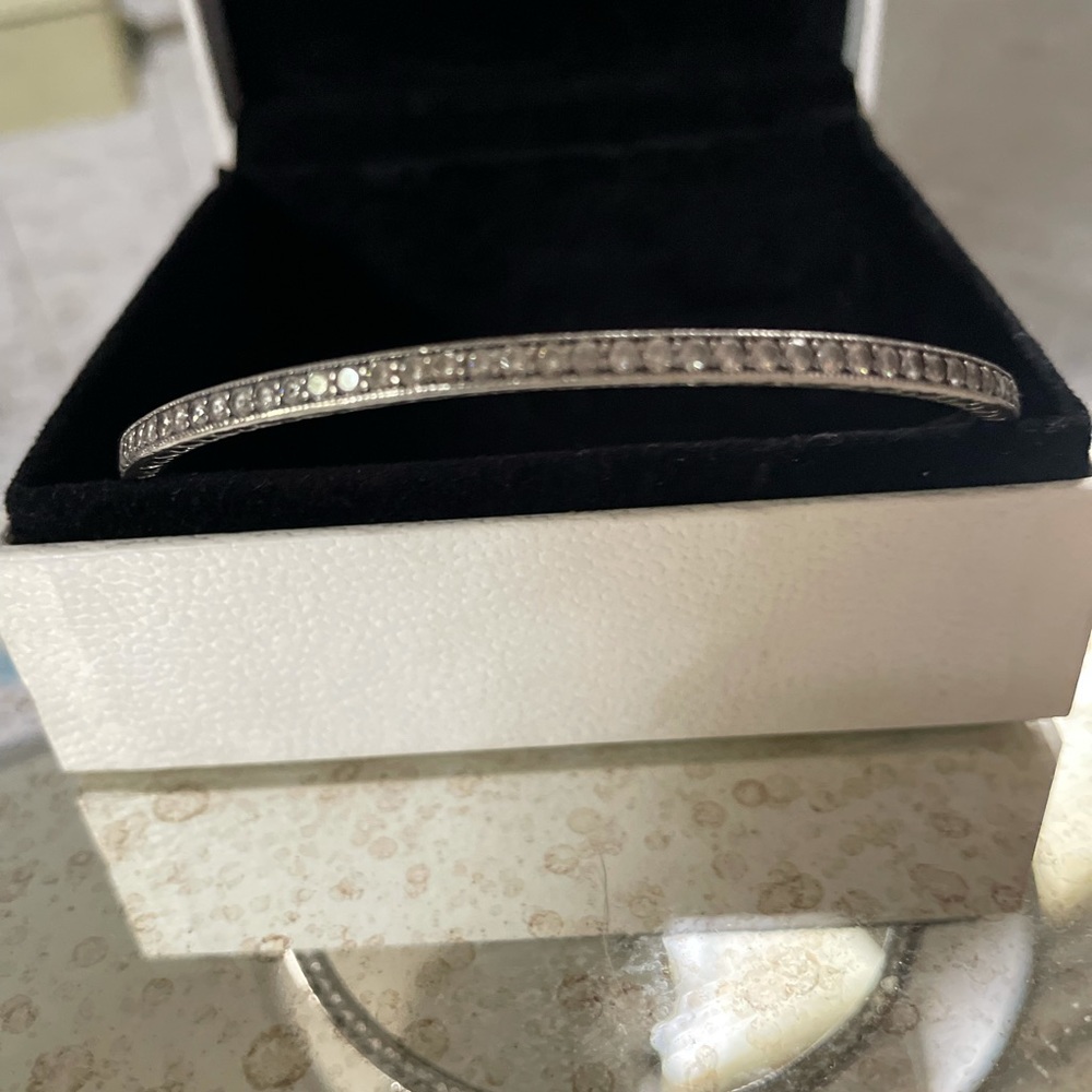 Pandora bangle with CZ's encrusted around it and also sterling silver / 925 ALE